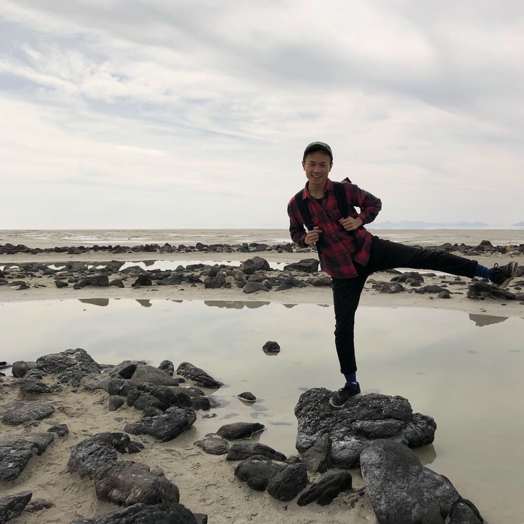 Andrew posing on a rock at spiral jetty
